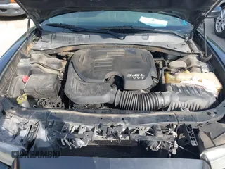 2014 Dodge Charger SE with VIN 2C3CDXBG9EH329419, listed as a IAAI auction lot 42025607 with 166,875 mi miles. Bid and sale history available at carsss.com. Image 10.