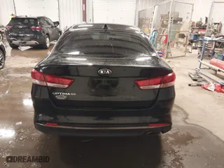 2017 Kia Optima LX with VIN 5XXGT4L31HG165150, listed as a IAAI auction lot 40985407 with 154,945 mi miles. Bid and sale history available at carsss.com. Image 15.