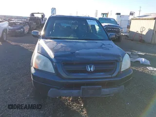 2003 Honda Pilot EX with VIN 2HKYF18433H614451, listed as a IAAI auction lot 41561972 with 199,394 mi miles. Bid and sale history available at carsss.com. Image 13.