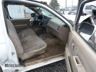 1999 Nissan Frontier XE with VIN 1N6DD21S0XC304100, listed as a IAAI auction lot 40891266 with 334,985 mi miles and . Bid and sale history available at DreamBid. Image 5.