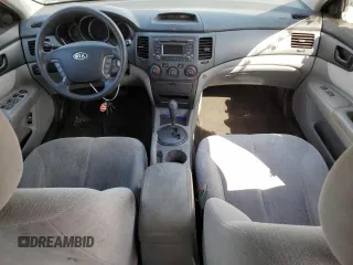 2010 Kia Optima LX z VIN KNAGG4A86A5426444, wystawiony jako Copart lot #61498275 z przebiegiem 166 526 mil mil oraz Czysty tytuł • Clean title. Historia ofert i sprzedaży dostępna na DreamBid. Obrazek 8.