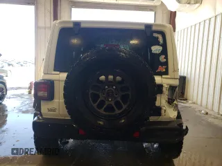 2023 Jeep Wrangler Sport S with VIN 1C4HJXDG3PW635415, listed as a Copart auction lot 48016565 with 31,494 mi miles and Salvage Title. Bid and sale history available at DreamBid. Image 6.