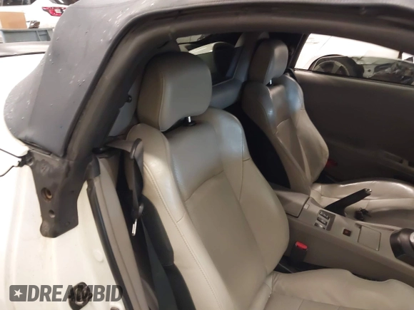 2005 Nissan 350Z Touring with VIN JN1AZ36A45M754923, listed as a IAAI auction lot 41720671 with 124,916 mi miles. Bid and sale history available at carsss.com. Image 8.