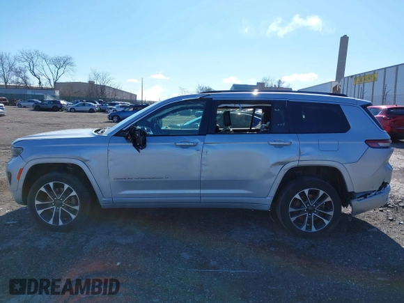 2021 Jeep Grand Cherokee Overland with VIN 1C4RJKDG0M8122002, listed as a IAAI auction lot 41748944 with 88,336 mi miles and . Bid and sale history available at DreamBid. Image 14.