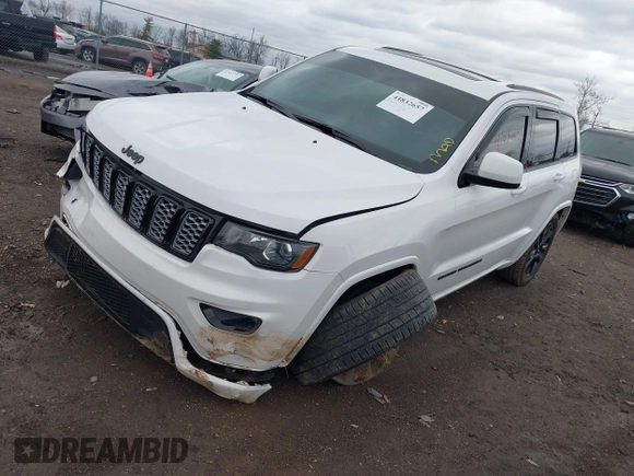 2018 Jeep Grand Cherokee Altitude with VIN 1C4RJFAG2JC284301, listed as a IAAI auction lot 41832657 with 97,160 mi miles and . Bid and sale history available at DreamBid. Image 2.