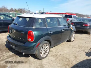 2013 MINI Countryman with VIN WMWZB3C57DWR35414, listed as a IAAI auction lot 41771890 with 141,561 mi miles and . Bid and sale history available at DreamBid. Image 4.