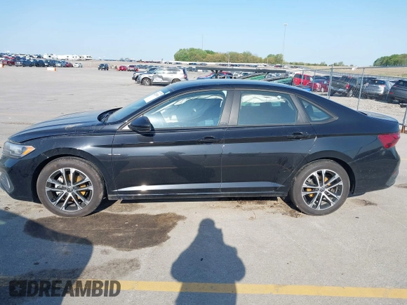 2023 Volkswagen Jetta Sport with VIN 3VWBM7BU2PM022530, listed as a IAAI auction lot 42215101 with 7,455 mi miles and . Bid and sale history available at DreamBid. Image 14.