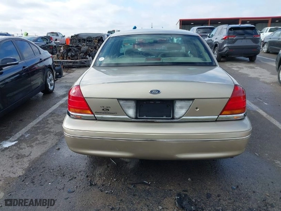 1999 Ford Crown Victoria LX with VIN 2FAFP74W0XX179512, listed as a IAAI auction lot 41124866 with 101,282 mi miles. Bid and sale history available at carsss.com. Image 16.