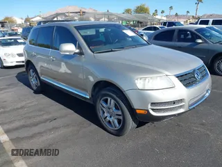 2005 Volkswagen Touareg 4.2L V8 with VIN WVGZM77L95D078731, listed as a IAAI auction lot 41342770 with 244,757 mi miles and . Bid and sale history available at DreamBid. Image 1.