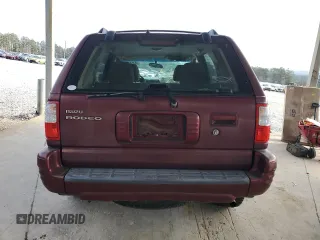 2002 Isuzu Rodeo S z VIN 4S2CK58W924328997, wystawiony jako Copart lot #41454525 z przebiegiem 110 569 mil mil oraz Szkoda całkowita • Salvage title. Historia ofert i sprzedaży dostępna na DreamBid. Obrazek 6.