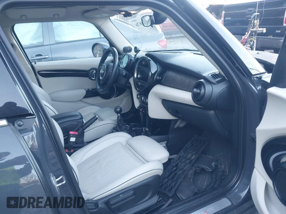 2016 MINI Cooper Hardtop 4 Door S with VIN WMWXU3C56G2B63682, listed as a IAAI auction lot 41244676 with 110,902 mi miles. Bid and sale history available at carsss.com. Image 5.