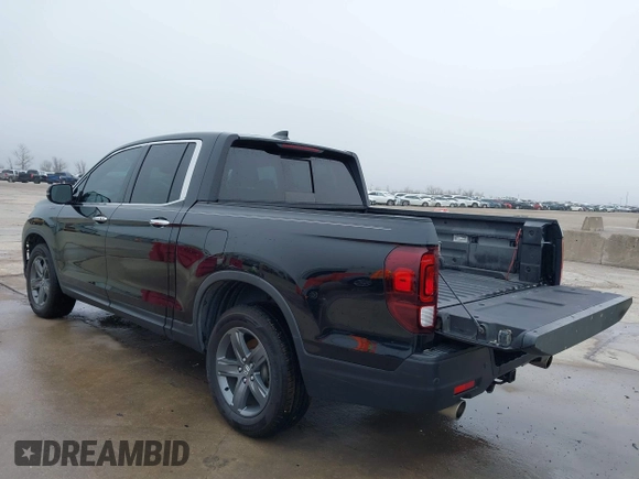 2022 Honda Ridgeline RTL-E with VIN 5FPYK3F75NB020036, listed as a IAAI auction lot 41500206 with 79,655 mi miles and . Bid and sale history available at DreamBid. Image 3.