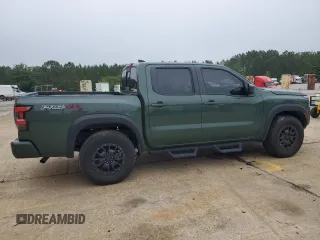 2022 Nissan Frontier Pro-4X z VIN 1N6ED1EKXNN602213, wystawiony jako Copart lot #56967775 z przebiegiem 32 937 mil mil oraz Szkody całkowita. Historia ofert i sprzedaży dostępna na DreamBid. Obrazek 3.