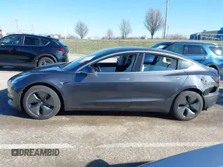 2018 Tesla Model 3 Long Range Battery with VIN 5YJ3E1EB6JF122167, listed as a IAAI auction lot 41761710 with 76,199 mi miles and . Bid and sale history available at DreamBid. Image 14.