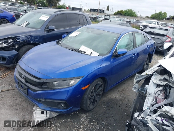2021 Honda Civic Sport with VIN 2HGFC2F87MH554620, listed as a IAAI auction lot 41743596 with 52,327 mi miles and . Bid and sale history available at DreamBid. Image 17.