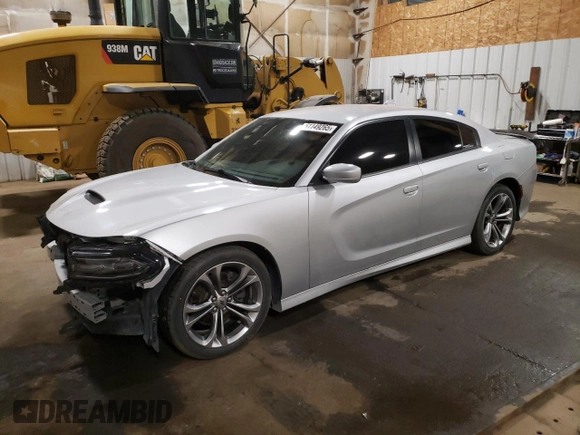 2021 Dodge Charger R/T with VIN 2C3CDXCT5MH522015, listed as a Copart auction lot 61149265 with 77,323 mi miles and Salvage title. Bid and sale history available at DreamBid. Image 1.