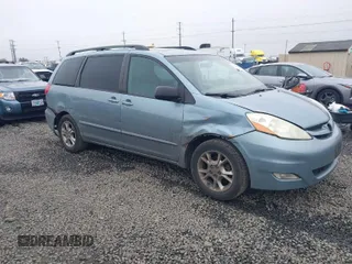 2006 Toyota Sienna XLE z VIN 5TDZA22C26S417357, wystawiony jako IAAI lot #41725599 z przebiegiem 239 684 mil mil oraz . Historia ofert i sprzedaży dostępna na DreamBid. Obrazek 1.