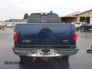 2003 Ford F-150 XLT with VIN 1FTRW08L33KC62060, listed as a IAAI auction lot 41618936 with 276,251 mi miles. Bid and sale history available at carsss.com. Image 16.