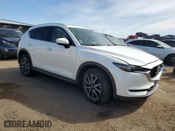 2018 Mazda CX-5 Grand Touring with VIN JM3KFADM5J1350107, listed as a Copart auction lot 50332375 with 110,319 mi miles and Salvage Title. Bid and sale history available at DreamBid. Image 4.