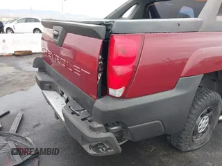 2004 Chevrolet Avalanche Z66 z VIN 3GNEC12T64G289291, wystawiony jako IAAI lot #41187923 z przebiegiem Nie podano mil oraz . Historia ofert i sprzedaży dostępna na DreamBid. Obrazek 13.