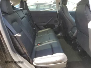 2024 Tesla Model Y Long Range with VIN 7SAYGAEE9RF125458, listed as a Copart auction lot 59567365 with 28,966 mi miles and Salvage title. Bid and sale history available at DreamBid. Image 11.