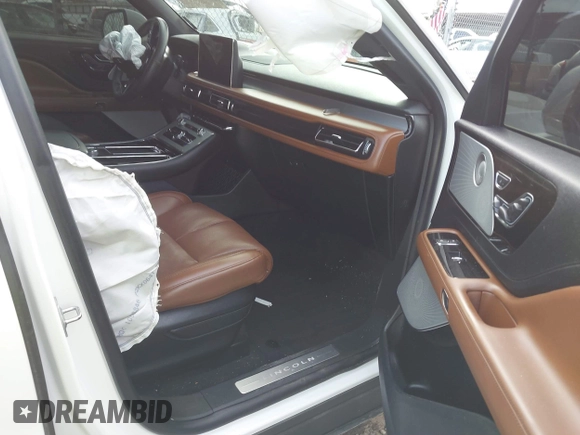 2021 Lincoln Aviator Reserve with VIN 5LM5J7XC5MGL18763, listed as a IAAI auction lot 41674701 with 92,284 mi miles and . Bid and sale history available at DreamBid. Image 5.