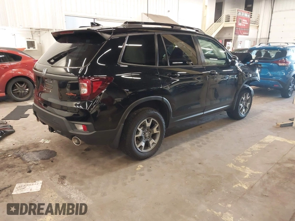 2023 Honda Passport TrailSport with VIN 5FNYF8H64PB016819, listed as a IAAI auction lot 41997402 with 22,106 mi miles and . Bid and sale history available at DreamBid. Image 4.