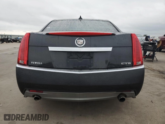 2009 Cadillac CTS RWD w/1SA with VIN 1G6DF577890122363, listed as a Copart auction lot 71401644 with 127,968 mi miles and Salvage Title. Bid and sale history available at carsss.com. Image 6.