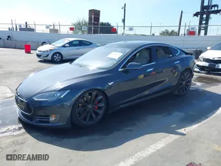 2015 Tesla Model S 85D with VIN 5YJSA1E41FF110217, listed as a IAAI auction lot 41594198 with 93746 miles. Bid and sale history available at carsss.com. Image 21.