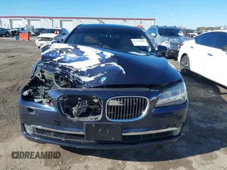 2012 BMW 7 Series 750Li xDrive with VIN WBAKC8C52CC436399, listed as a IAAI auction lot 41214440 with 122,532 mi miles and . Bid and sale history available at DreamBid. Image 12.