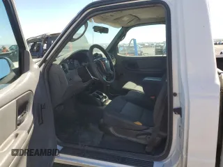 2004 Ford Ranger XL with VIN 1FTYR10U24PA08874, listed as a Copart auction lot 66931814 with 219,415 mi miles and Salvage title. Bid and sale history available at DreamBid. Image 7.