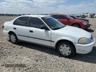 1997 Honda Civic LX with VIN 1HGEJ6672VL028626, listed as a Copart auction lot 44338115 with 120,199 mi miles and Salvage Title. Bid and sale history available at carsss.com. Image 4.