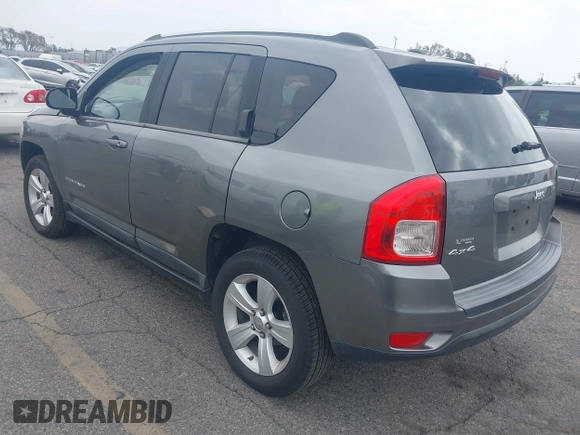 2011 Jeep Compass with VIN 1J4NF1FB7BD244088, listed as a IAAI auction lot 41889165 with 93,576 mi miles. Bid and sale history available at carsss.com. Image 3.