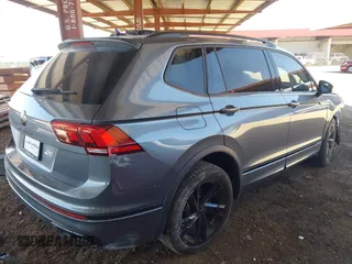 2024 Volkswagen Tiguan SE R-Line Black with VIN 3VVCB7AX4RM046261, listed as a IAAI auction lot 42327569 with 15,428 mi miles and . Bid and sale history available at DreamBid. Image 4.