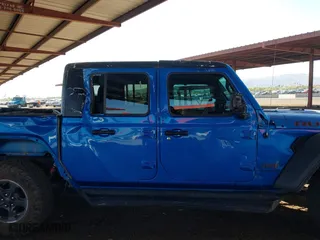 2021 Jeep Gladiator Rubicon with VIN 1C6JJTBGXML516164, listed as a IAAI auction lot 41837544 with 48,197 mi miles. Bid and sale history available at carsss.com. Image 12.