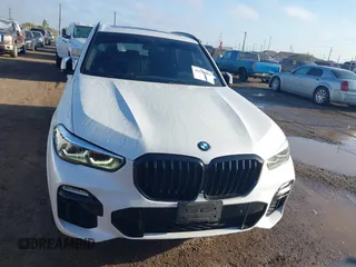 2021 BMW X5 sDrive40i with VIN 5UXCR4C00M9D80482, listed as a IAAI auction lot 41636009 with 85,103 mi miles. Bid and sale history available at carsss.com. Image 12.