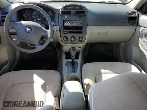 2005 Kia Spectra LX with VIN KNAFE122555102997, listed as a Copart auction lot 54191025 with 142,071 mi miles and Salvage Title. Bid and sale history available at carsss.com. Image 8.