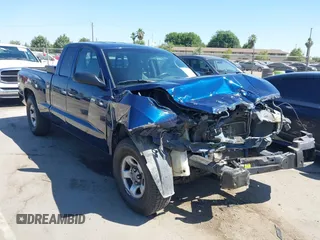 2005 Dodge Dakota with VIN 1D7HW22N95S367924, listed as a IAAI auction lot 42515863 with 133,089 mi miles and . Bid and sale history available at DreamBid. Image 1.