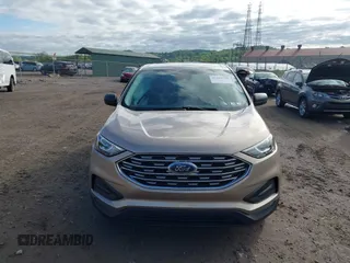 2021 Ford Edge SE with VIN 2FMPK4G90MBA19667, listed as a IAAI auction lot 42215758 with 27,496 mi miles and . Bid and sale history available at DreamBid. Image 12.