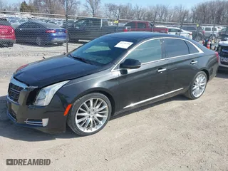 2014 Cadillac XTS Platinum with VIN 2G61W5S84E9127014, listed as a IAAI auction lot 41776334 with 99,879 mi miles. Bid and sale history available at carsss.com. Image 19.