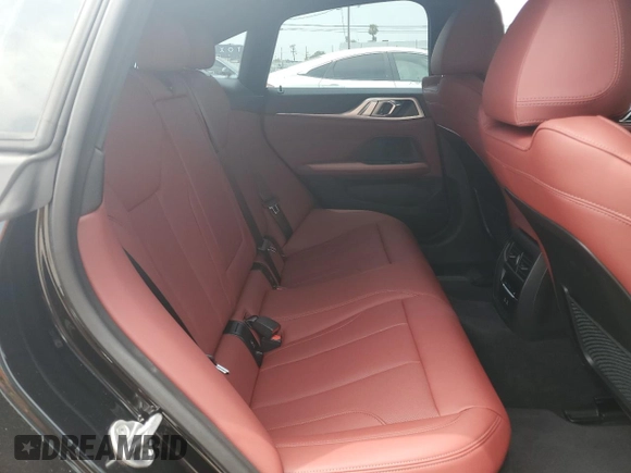 2024 BMW i4 eDrive35 with VIN WBY43AW02RFT03098, listed as a Copart auction lot 57317884 with 203 mi miles and Salvage Title. Bid and sale history available at carsss.com. Image 10.