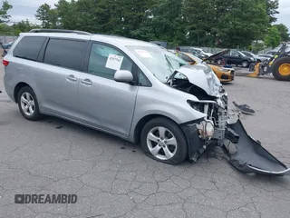 2015 Toyota Sienna LE AAS with VIN 5TDKK3DC6FS688844, listed as a IAAI auction lot 42557542 with 95,520 mi miles and . Bid and sale history available at DreamBid. Image 1.