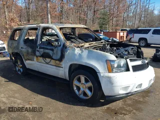 2014 Chevrolet Tahoe LTZ z VIN 1GNSCCE09ER143369, wystawiony jako IAAI lot #40821989 z przebiegiem Nie podano mil oraz . Historia ofert i sprzedaży dostępna na DreamBid. Obrazek 1.