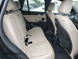 2018 BMW X1 xDrive28i z VIN WBXHT3C39J5L34133, wystawiony jako Copart lot #60195805 z przebiegiem 49 551 mil mil oraz Szkoda całkowita • Salvage title. Historia ofert i sprzedaży dostępna na DreamBid. Obrazek 11.