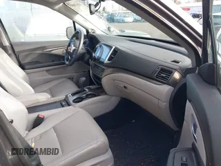 2017 Honda Pilot EX-L with VIN 5FNYF6H5XHB059834, listed as a IAAI auction lot 41670003 with 58,285 mi miles and . Bid and sale history available at DreamBid. Image 5.