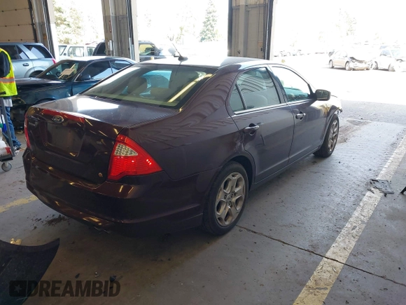 2011 Ford Fusion SE with VIN 3FAHP0HAXBR160083, listed as a IAAI auction lot 41964198 with 114,552 mi miles. Bid and sale history available at carsss.com. Image 4.
