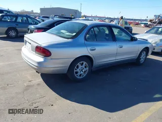 2002 Oldsmobile Intrigue GX z VIN 1G3WH52H02F104930, wystawiony jako IAAI lot #41882923 z przebiegiem 187 601 mil mil oraz . Historia ofert i sprzedaży dostępna na DreamBid. Obrazek 4.