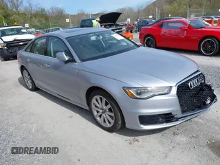 2016 Audi A6 Premium Plus with VIN WAUFGAFC9GN127742, listed as a IAAI auction lot 42032336 with 116,859 mi miles and . Bid and sale history available at DreamBid. Image 1.