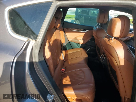 2017 Maserati Levante S z VIN ZN661YUS1HX225966, wystawiony jako Copart lot #52089285 z przebiegiem 118 690 mil mil oraz Szkoda całkowita • Salvage title. Historia ofert i sprzedaży dostępna na DreamBid. Obrazek 10.