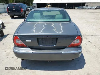 2004 Jaguar XJ with VIN SAJWA73B64TG18784, listed as a Copart auction lot 81254734 with 0 mi miles and Clean Title. Bid and sale history available at carsss.com. Image 6.
